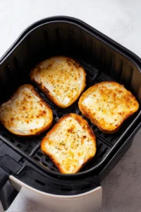 Spread cottage cheese evenly over each slice of whole grain bread.