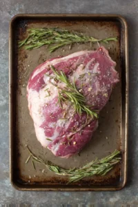 Spread lamb on the sheet pan and roast in the oven