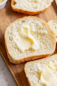 Spread softened butter on one side of each slice of bread