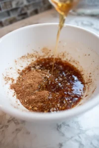 Toss grapes with honey and cinnamon in a large bowl