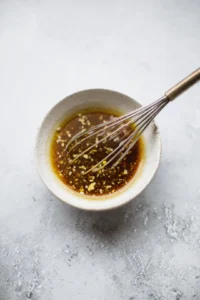 Whisk honey, soy sauce, and minced garlic in a bowl to make the sauce