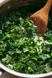 Add chopped kale and cook until wilted