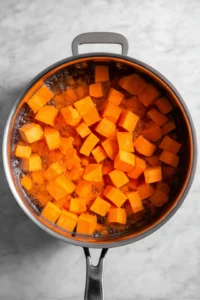 Boil the diced sweet potatoes and red lentils until soft