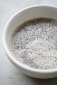 Combine chia seeds and almond milk in a bowl and let sit for 5 minutes