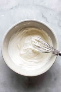 Combine Greek yogurt and honey in a bowl and stir until well mixed