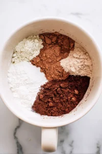 Combine the flour, cocoa powder, sugar, and adaptogenic mushroom powder in a mixing bowl until well blended