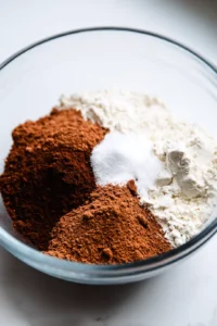 Combine the flour, sugar, cocoa powder, baking soda, and salt in a large bowl