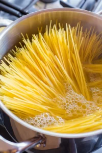 Cook capellini pasta until al dente