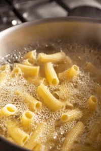 Cook pasta until al dente and reserve pasta water