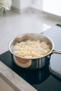 Cook tortellini according to package instructions until al dente and drain