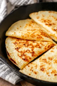 Cook tortillas until golden brown and cheese is melted
