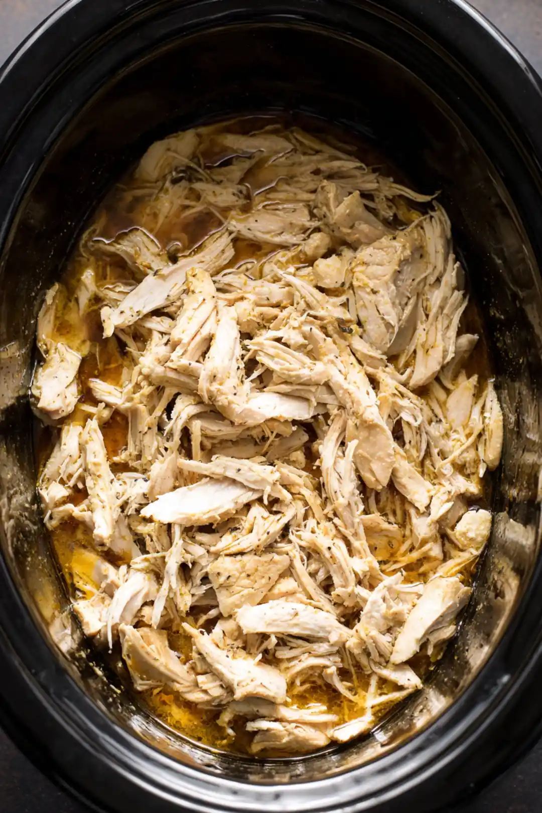 Cover and cook on low for 8 hours, or until the chicken is tender and shreds easily with a fork. Serve warm.