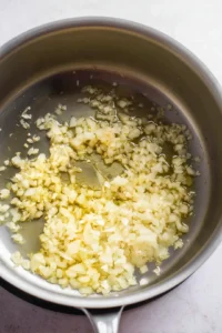 Heat olive oil and sauté onion and garlic