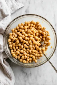 Mash chickpeas until smooth but still chunky