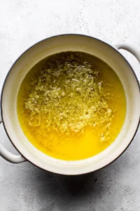 Melt butter and stir in miso paste