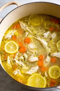 Pour in the chicken broth and bring the mixture to a gentle simmer