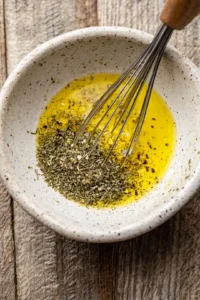 Pour the dressing over the salad and mix gently until everything is well combined