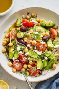 Pour the dressing over the salad mixture and gently toss to coat all ingredients evenly