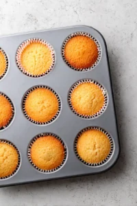 Preheat the oven to 350 degrees Fahrenheit and line a muffin tin with cupcake liners