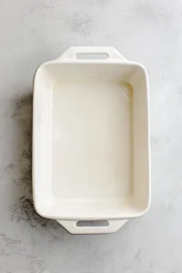 Preheat your oven to 350°F (175°C) and grease a 9x13-inch baking dish.