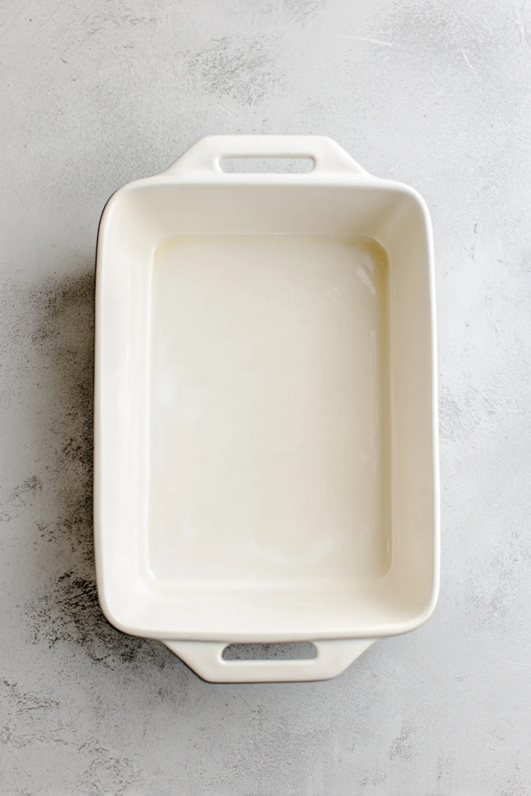 Preheat your oven to 350°F (175°C) and grease a 9x13-inch baking dish.