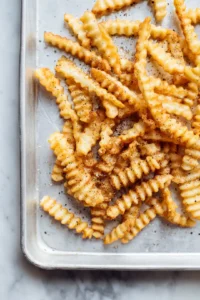 Preheat your oven to 425 degrees Fahrenheit and prepare fries