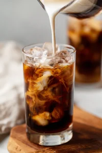 Prepare iced espresso with coffee and ice