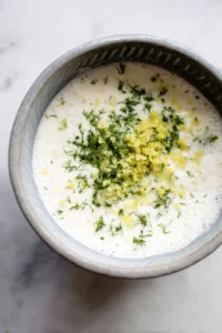 Prepare the kefir dip by mixing kefir, dill, garlic, and lemon zest