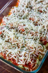 Repeat layering process with remaining ingredients and top with shredded mozzarella cheese, bake until bubbling and golden