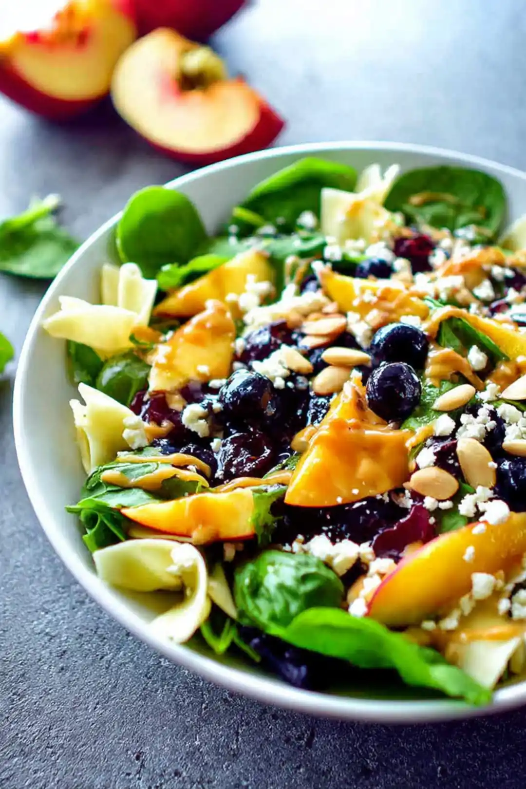 Salad with blueberries, peaches, and feta
