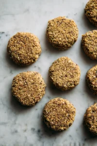 Shape the mixture into patties and cook them on a non-stick skillet over medium heat for 5-7 minutes on each side, until golden brown.