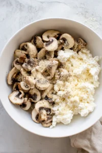 Stuff pasta shells with cheese mixture and bake