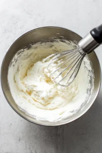 Whisk infused tallow until light and fluffy